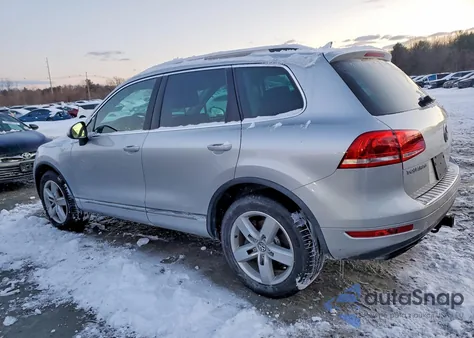 2012 Volkswagen Touareg V6 z USA, uszkodzony, nr VIN WVGEF9BP7CD007796